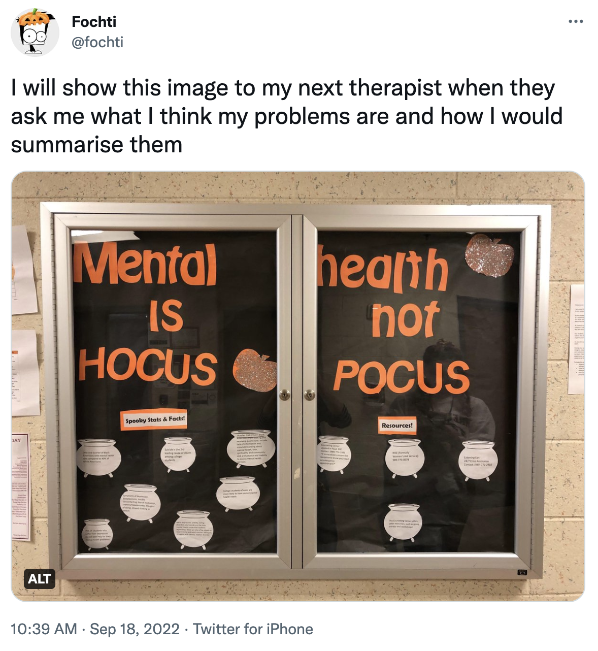 A tweet with an image showing a Halloween-themed school bulletin board that says "Mental health is not hocus pocus." The tweet captions it: "I will show this image to my next therapist when they ask me what I think my problems are and how I would summarize them."