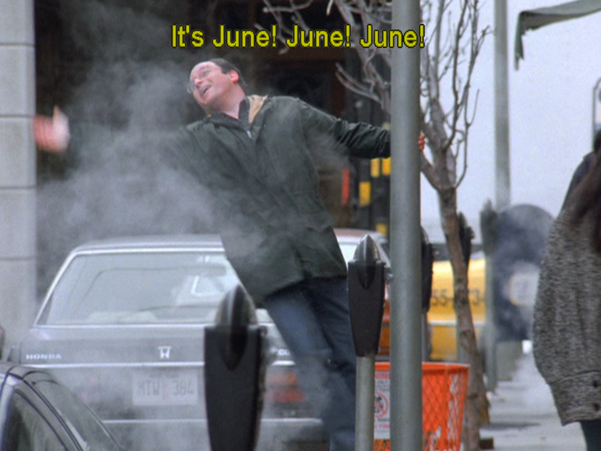 A screenshot from the TV show Seinfeld. George Costanza is dangling off a utility pole, happily proclaiming, "It's June! June! June!"